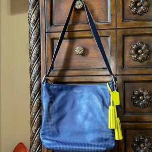 Coach Legacy Perforated Leather Crossbody bag.